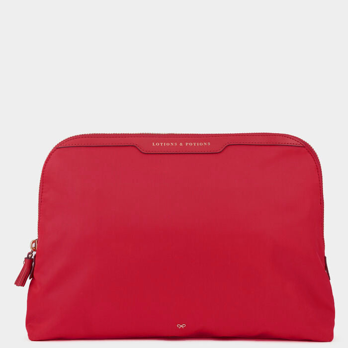 Lotions and Potions Pouch -

          
            Econyl® in Red -
          

          Anya Hindmarch EU
