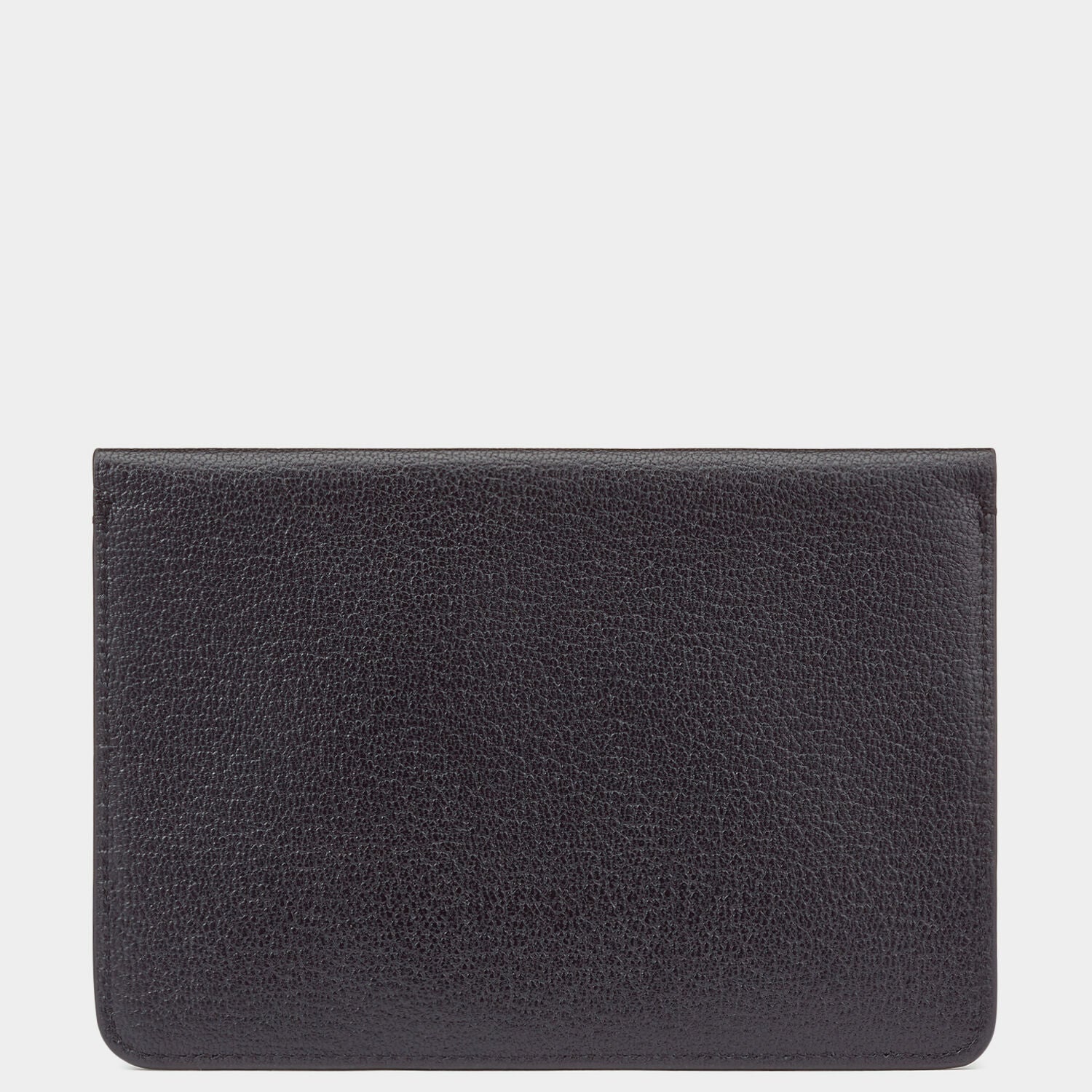 Envelope Passport Holder -

          
            Capra in Black -
          

          Anya Hindmarch EU
