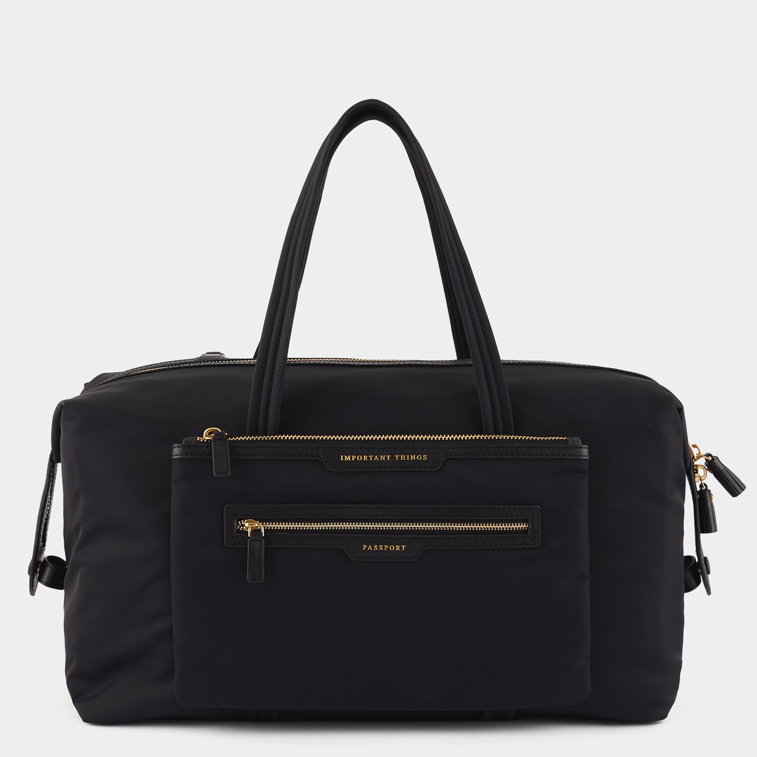 In-Flight Travel Bag -

          
            Regenerated Econyl® in Black -
          

          Anya Hindmarch EU
