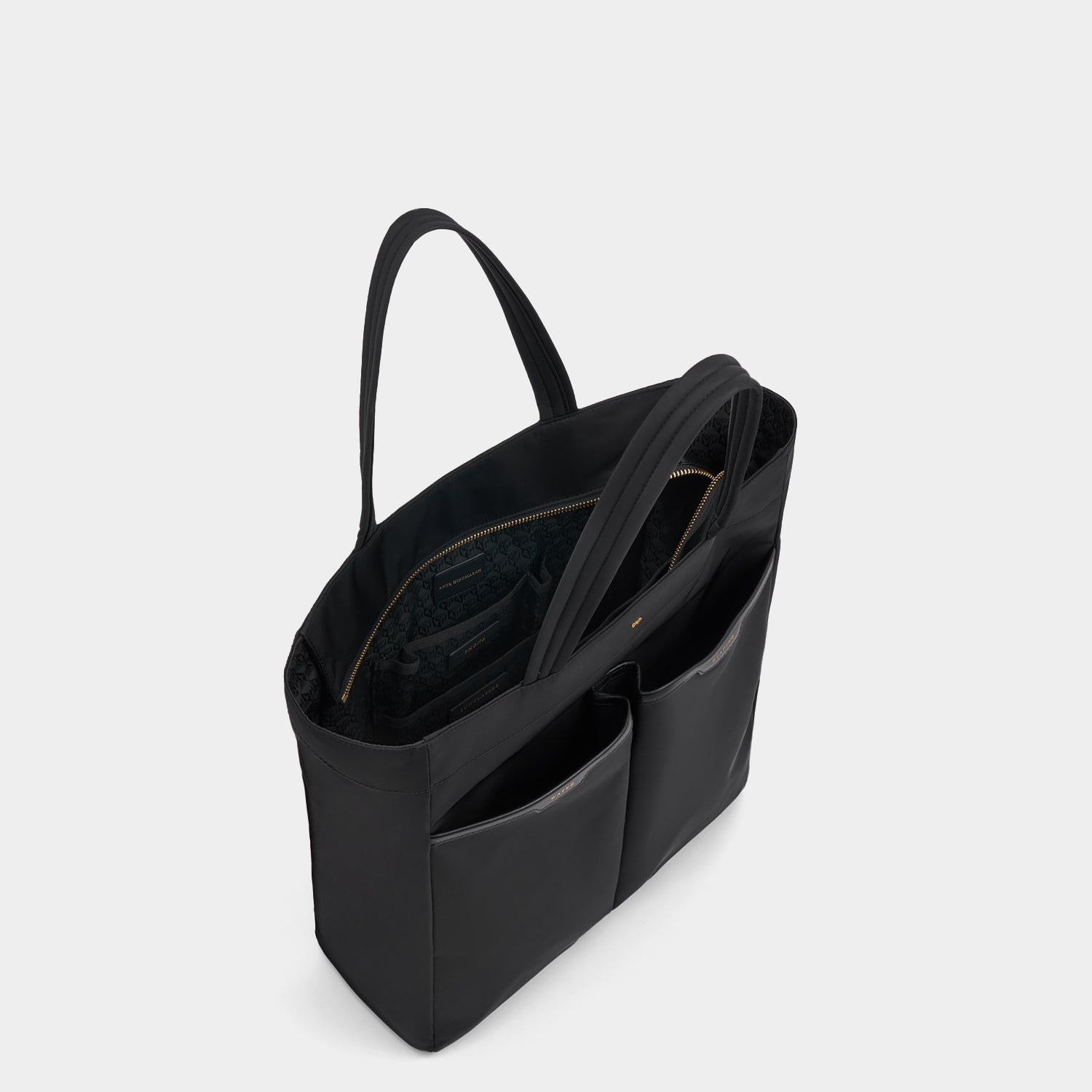 Nevis Tote -

          
            Regenerated ECONYL® in Black -
          

          Anya Hindmarch EU
