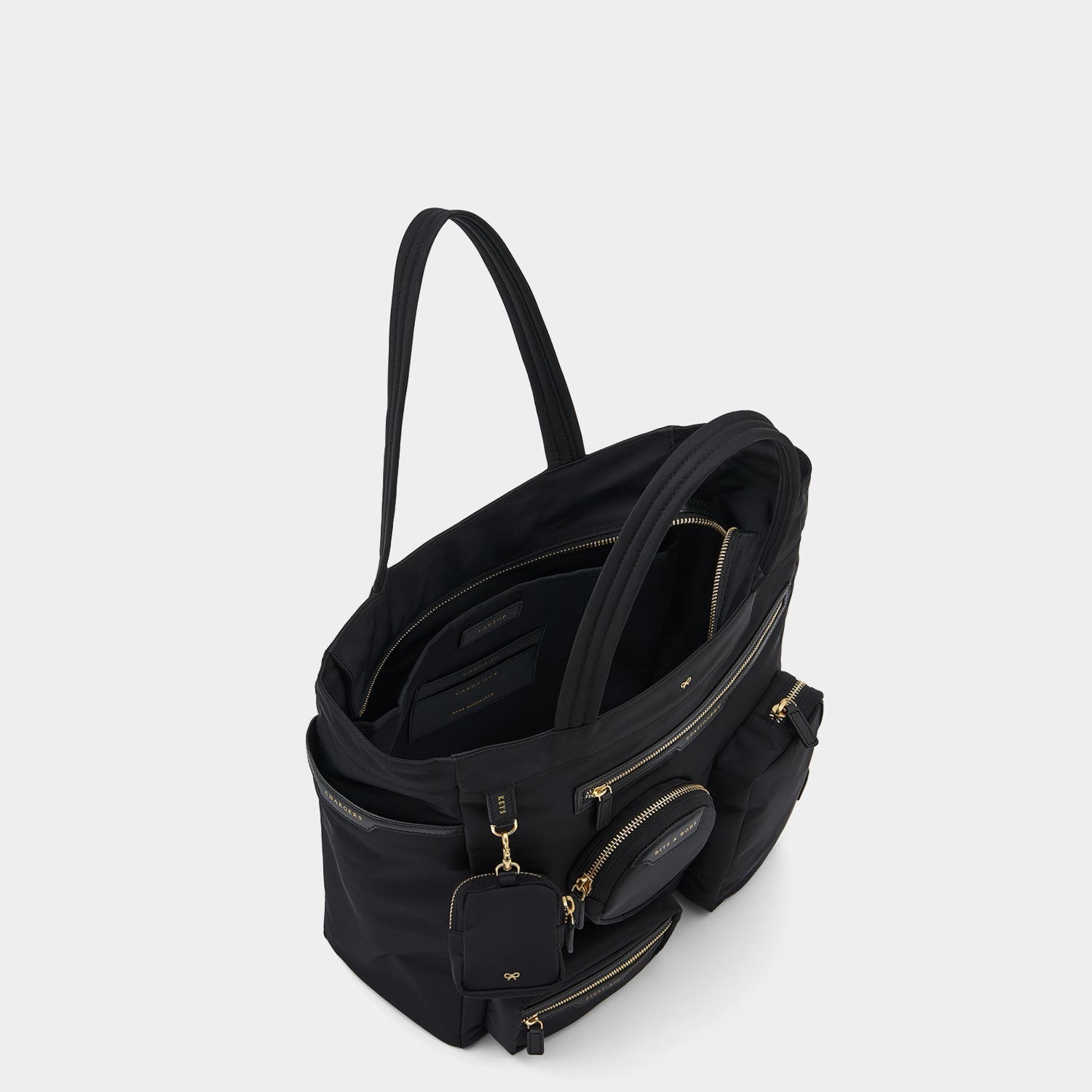 Commuter Tote -

          
            Regenerated Econyl® in Black -
          

          Anya Hindmarch EU
