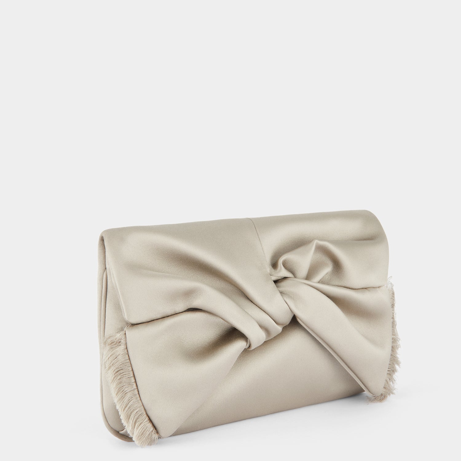 Bow Clutch -

          
            Satin in Silver -
          

          Anya Hindmarch EU
