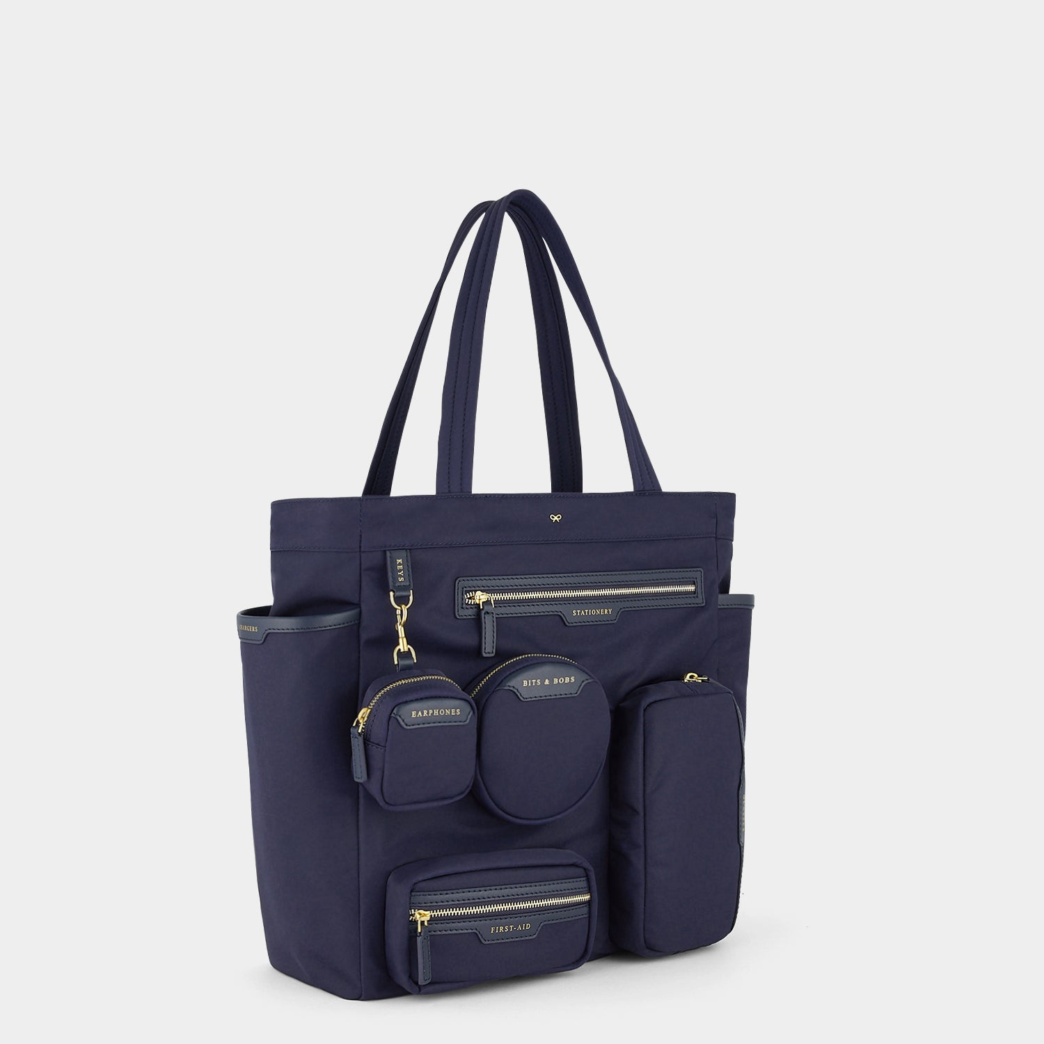 Commuter Tote -

          
            Regenerated Econyl® in Marine -
          

          Anya Hindmarch EU
