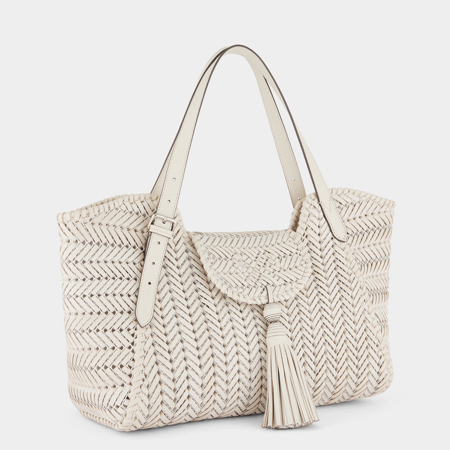 Neeson Tassel Tote -

                  
                    Shiny Capra in Chalk -
                  

                  Anya Hindmarch EU
