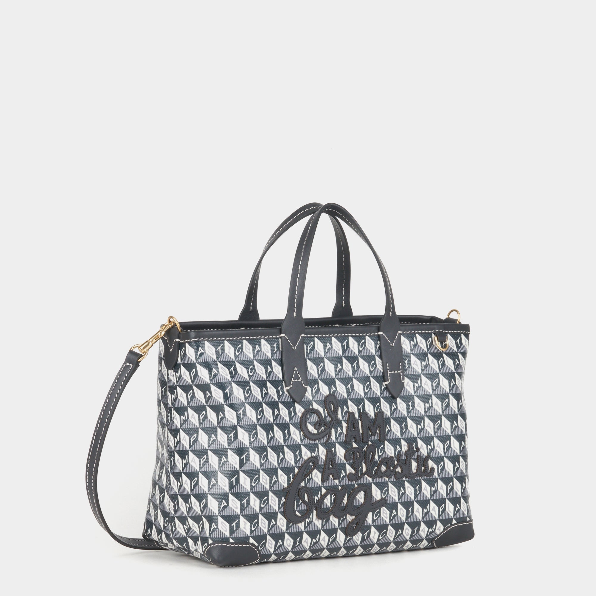 I Am A Plastic Bag XS Motif Tote -

                  
                    Recycled Canvas in Charcoal -
                  

                  Anya Hindmarch EU
