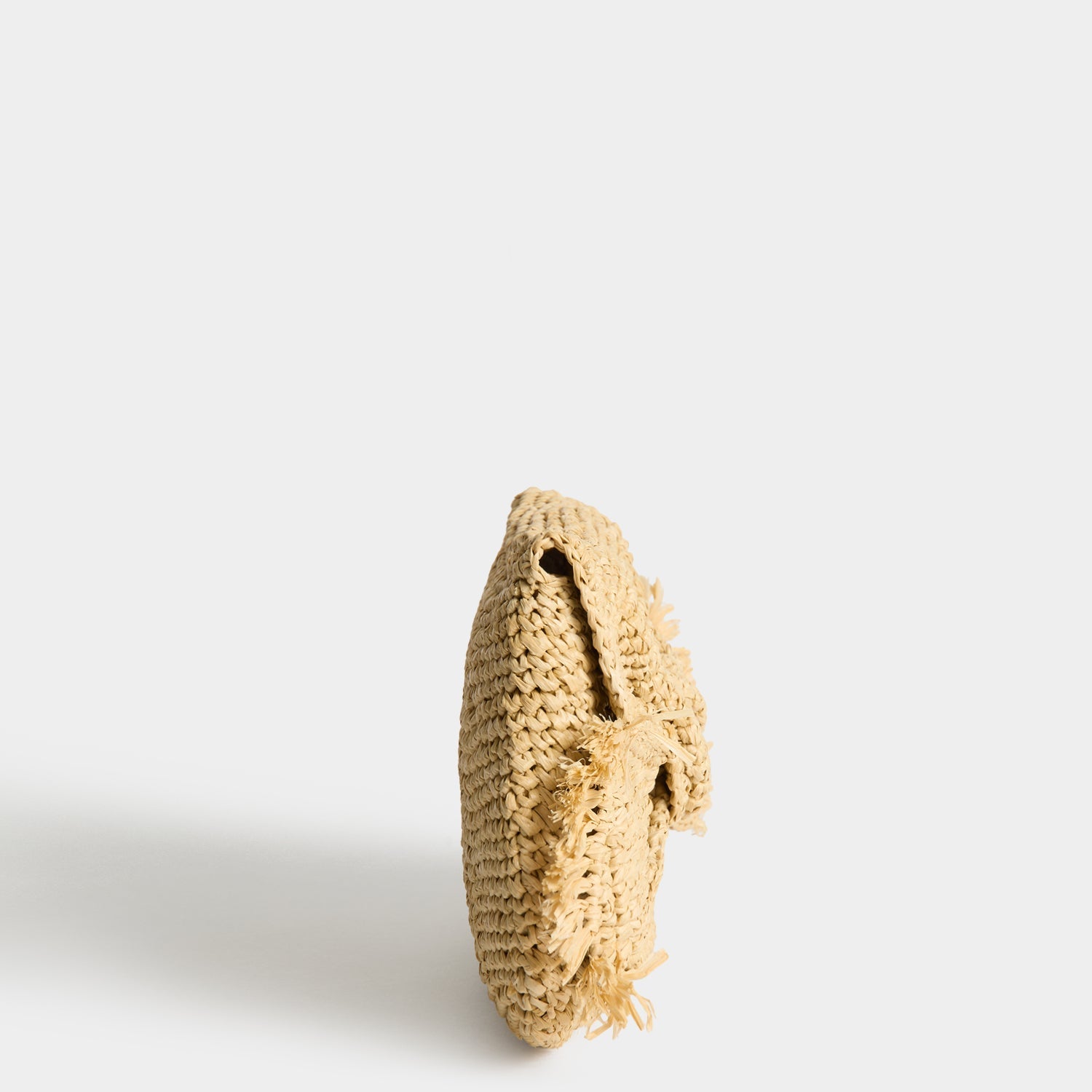 Raffia Bow Clutch -

          
            Raffia in Natural -
          

          Anya Hindmarch EU
