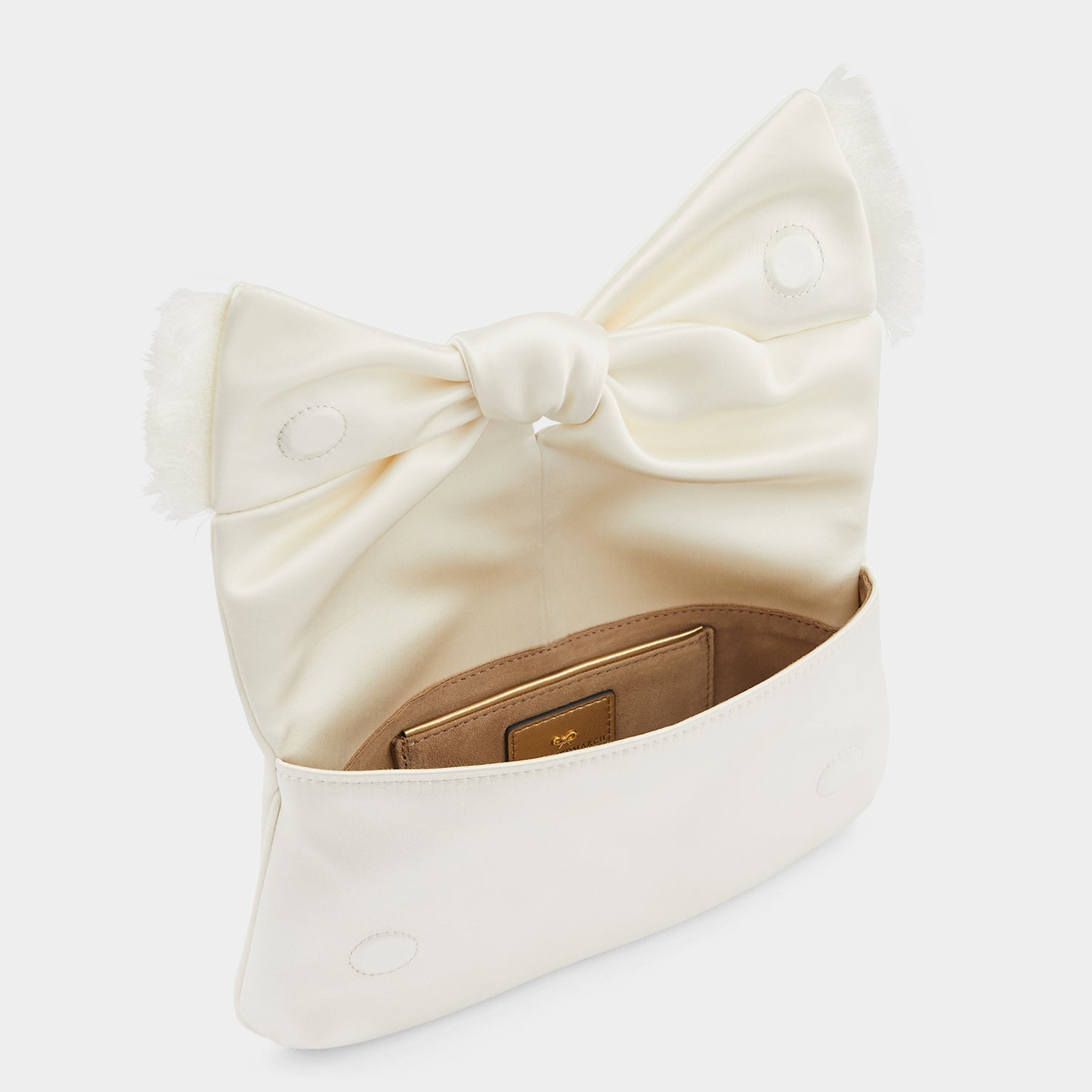 Bow Clutch -

          
            Double Satin in Ivory -
          

          Anya Hindmarch EU
