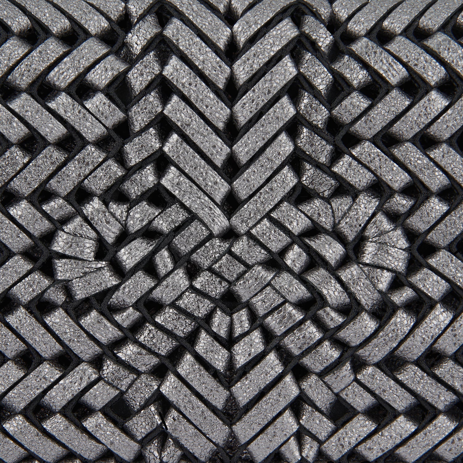 Neeson Tassel Clutch -

                  
                    Metallic Leather in Anthracite -
                  

                  Anya Hindmarch EU
