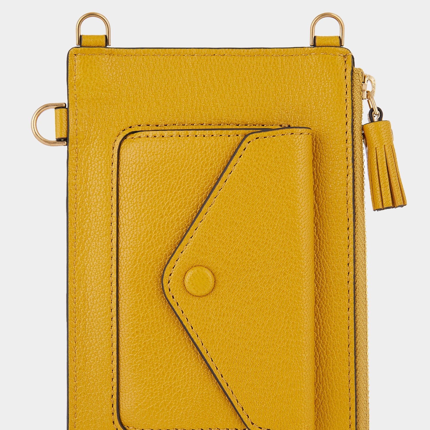 Anya Brands Coco Pops Zip Phone Pouch on Strap -

                  
                    Shiny Capra Leather in Mustard -
                  

                  Anya Hindmarch EU
