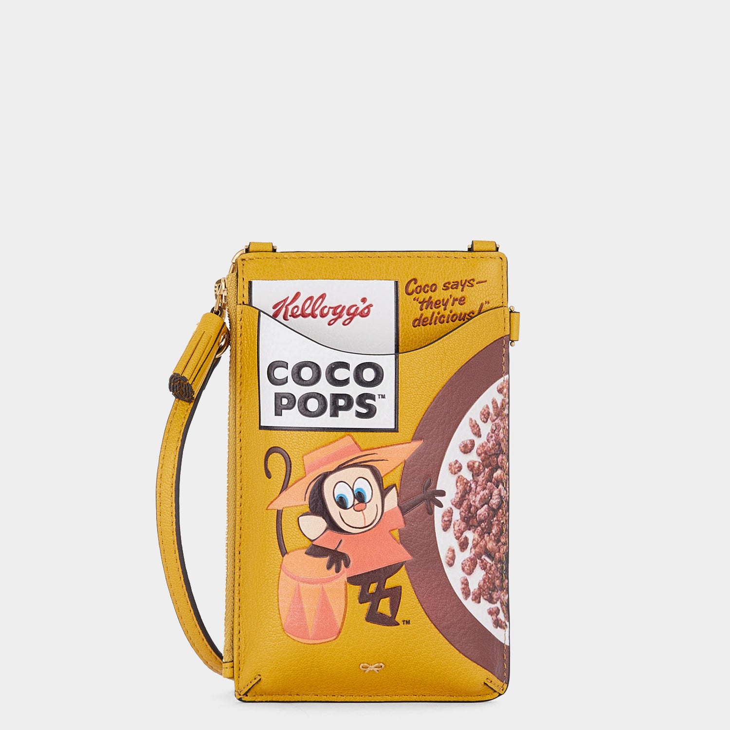Anya Brands Coco Pops Zip Phone Pouch on Strap -

                  
                    Shiny Capra Leather in Mustard -
                  

                  Anya Hindmarch EU
