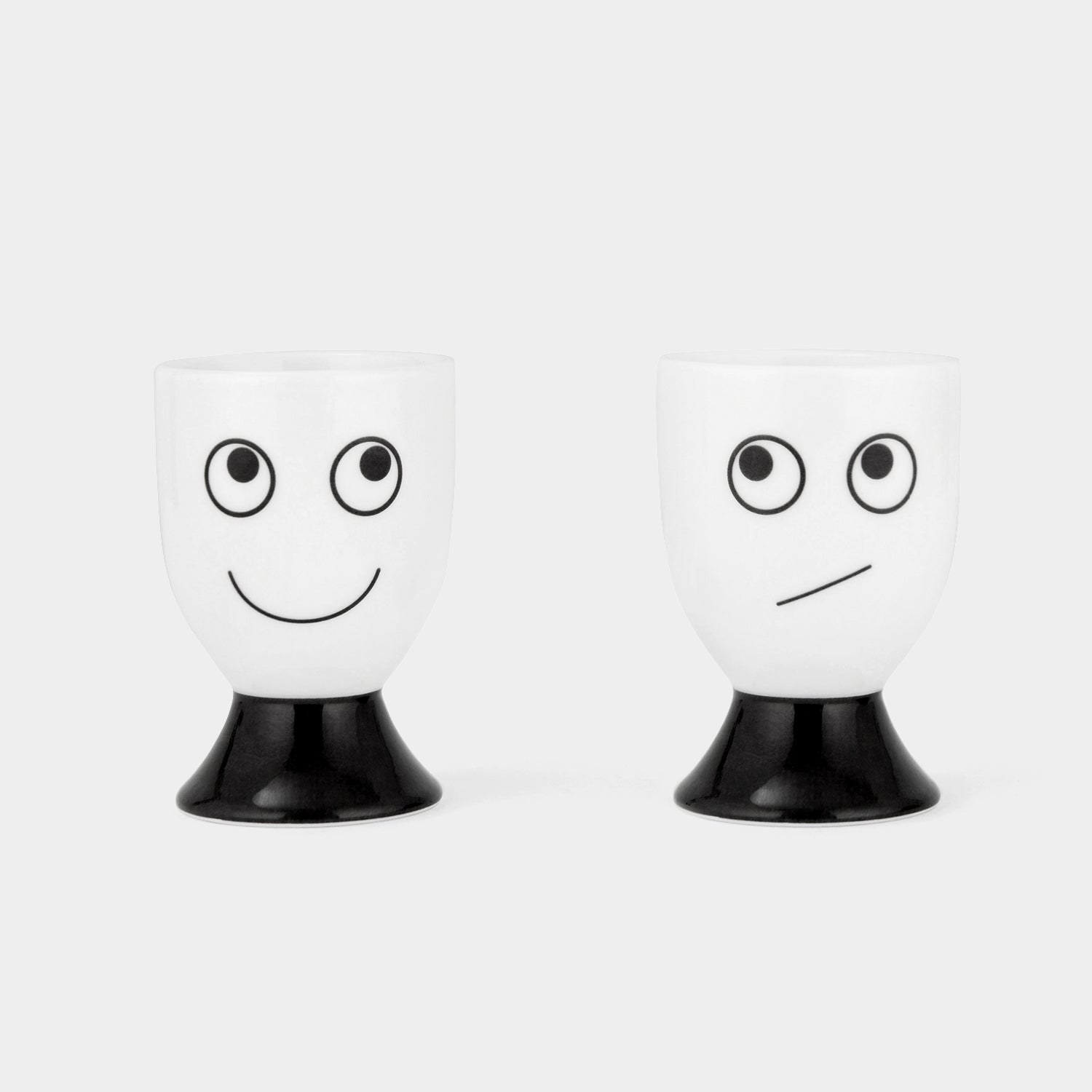 Eyes Egg Cup Set -

          
            Bone China in White -
          

          Anya Hindmarch EU
