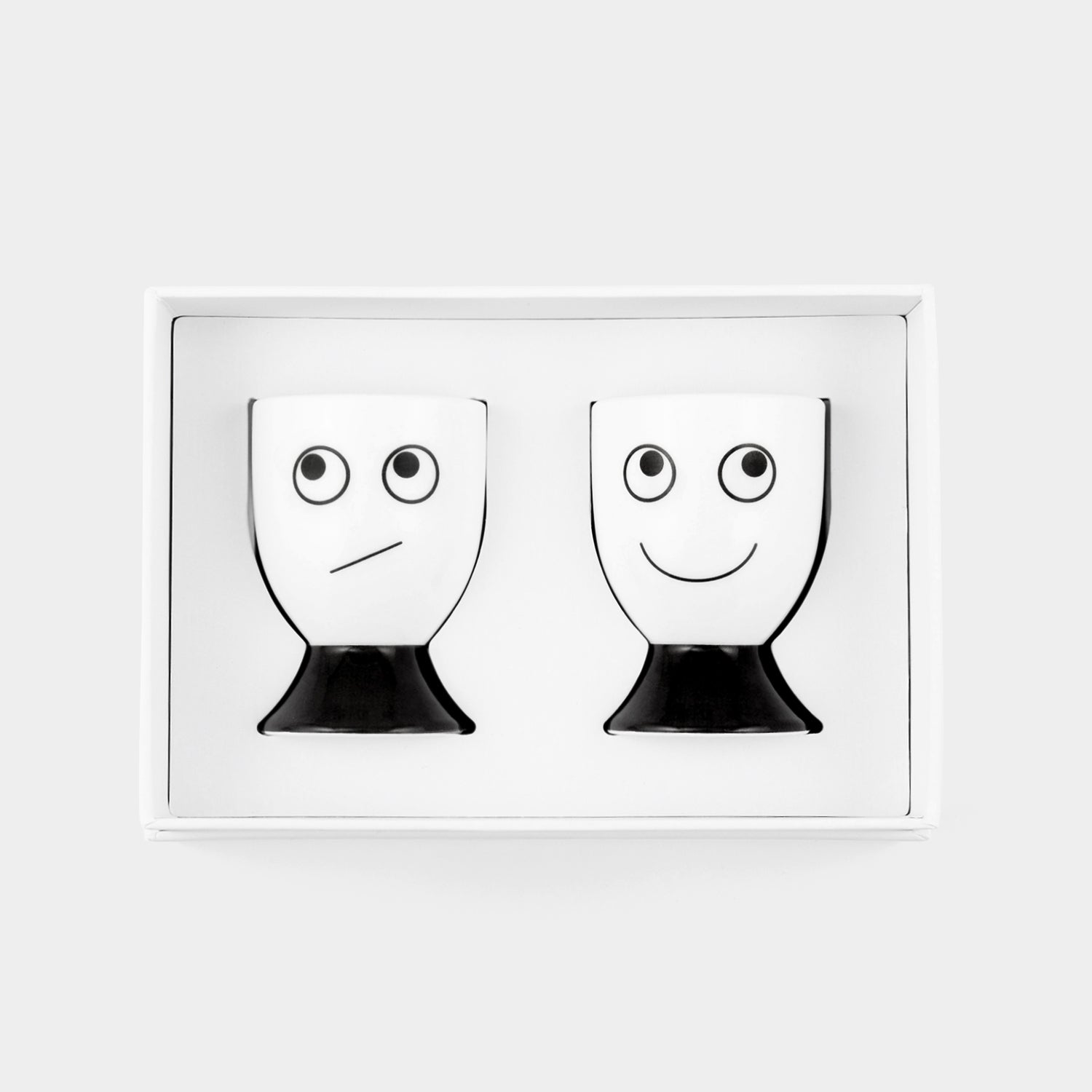 Eyes Egg Cup Set -

          
            Bone China in White -
          

          Anya Hindmarch EU

