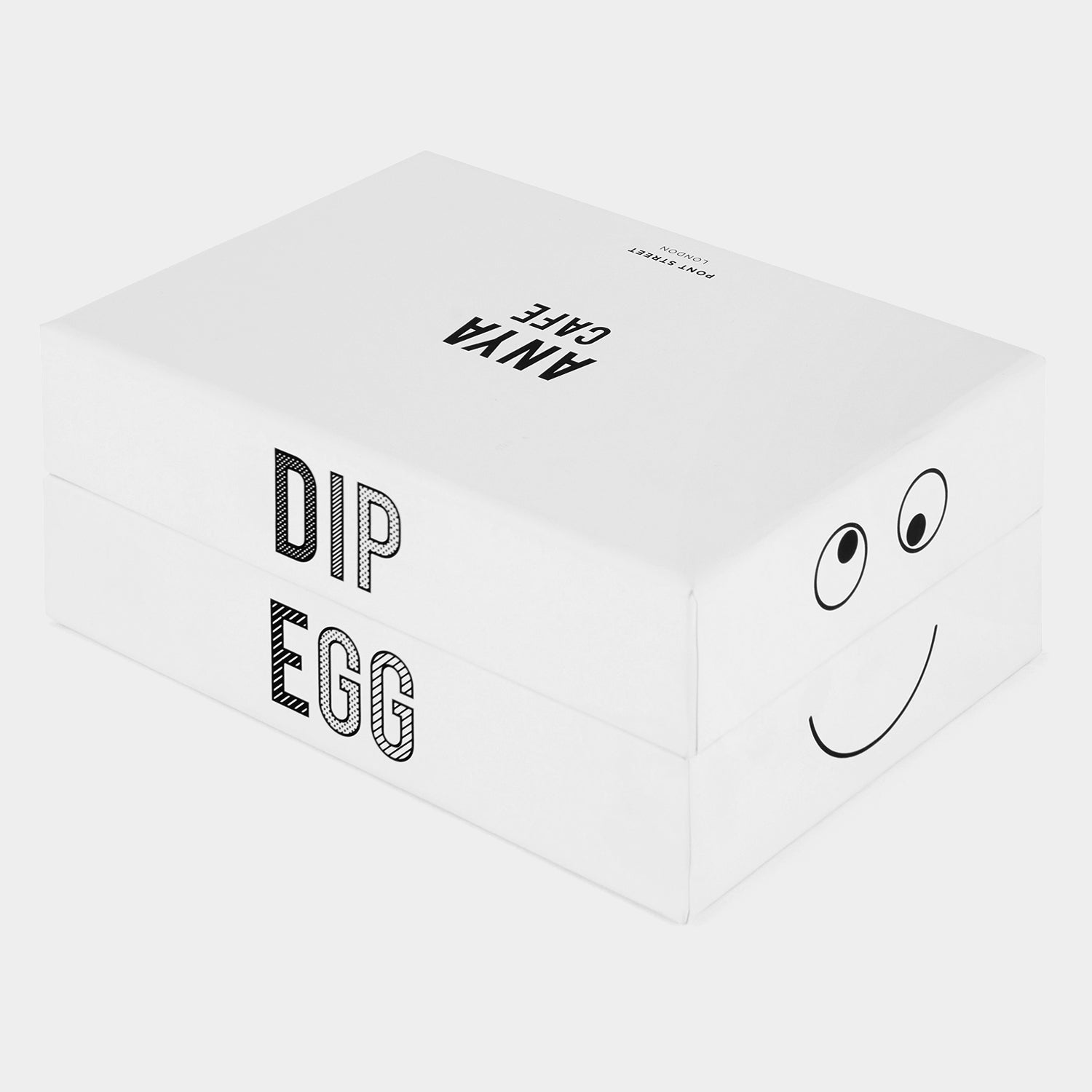 Eyes Egg Cup Set -

          
            Bone China in White -
          

          Anya Hindmarch EU

