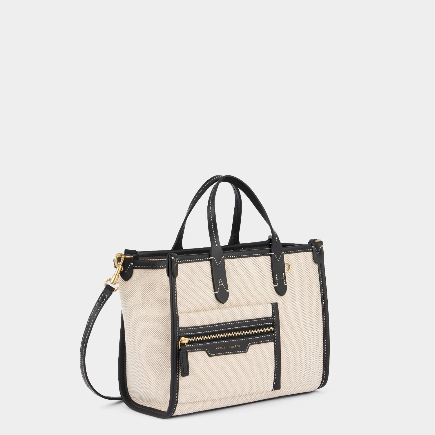 Pocket XS Cross-body Tote -

          
            Mixed Canvas in Natural -
          

          Anya Hindmarch EU
