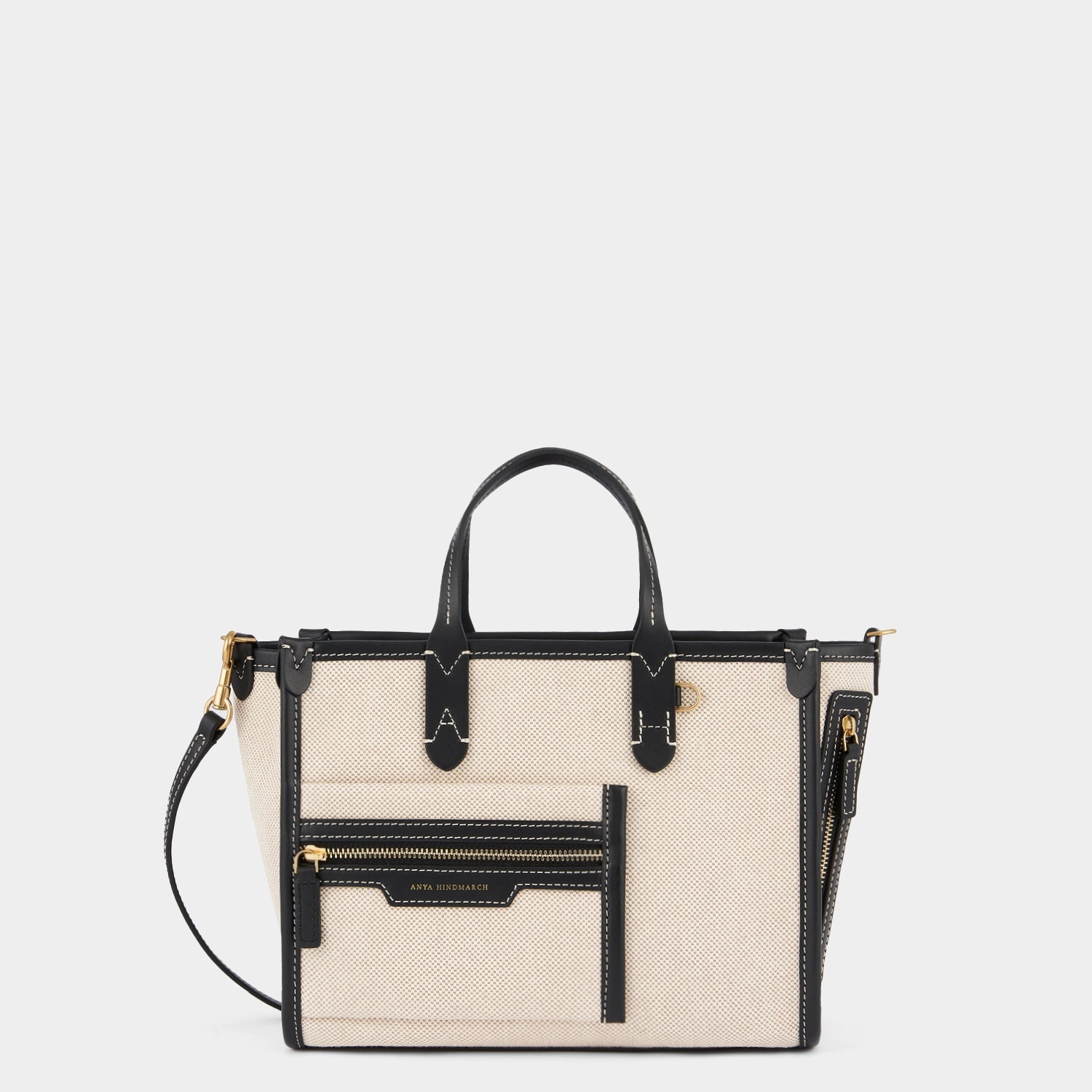 Pocket XS Cross-body Tote -

          
            Mixed Canvas in Natural -
          

          Anya Hindmarch EU
