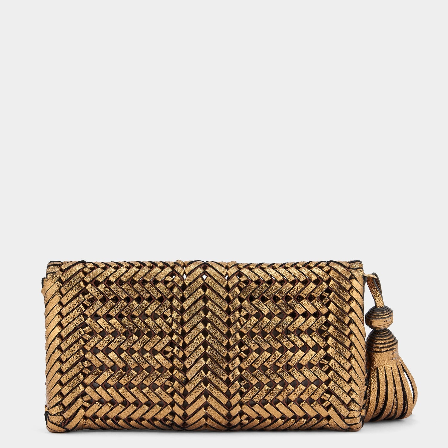 Neeson Tassel Clutch -

                  
                    Metallic Leather in Bronze -
                  

                  Anya Hindmarch EU
