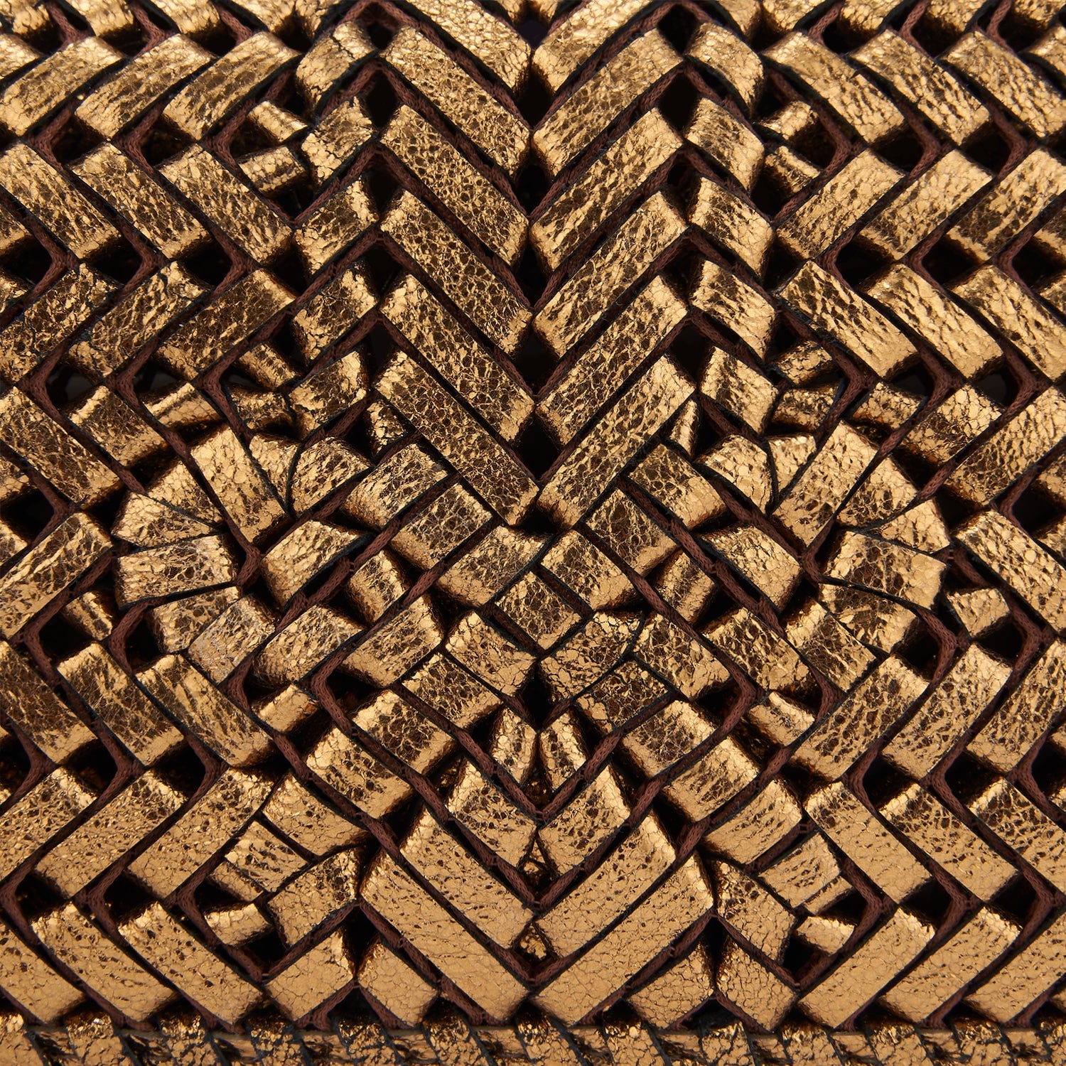 Neeson Tassel Clutch -

                  
                    Metallic Leather in Bronze -
                  

                  Anya Hindmarch EU
