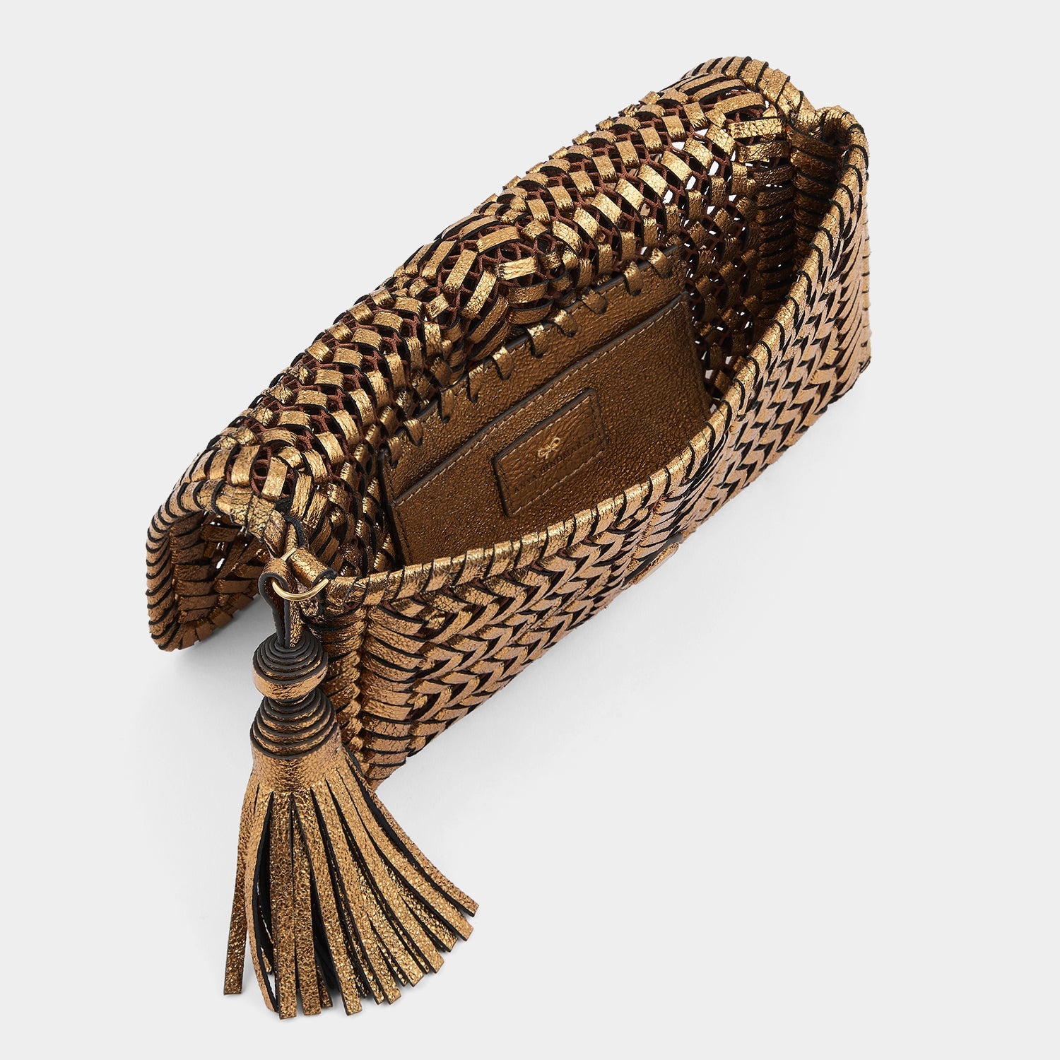 Neeson Tassel Clutch -

                  
                    Metallic Leather in Bronze -
                  

                  Anya Hindmarch EU
