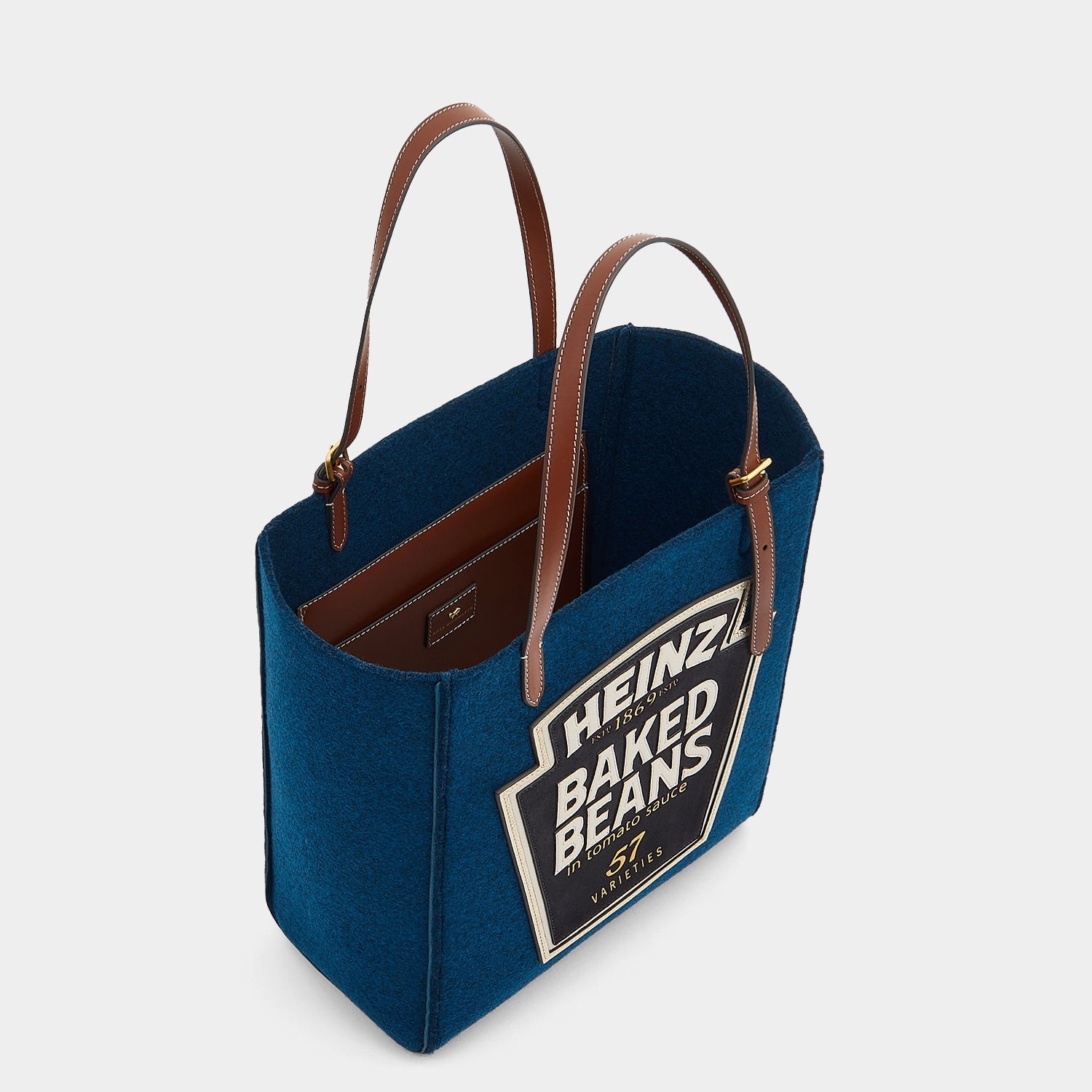 Anya Brands Heinz Baked Beans Small Tote -

                  
                    Recycled Felt in Teal -
                  

                  Anya Hindmarch EU
