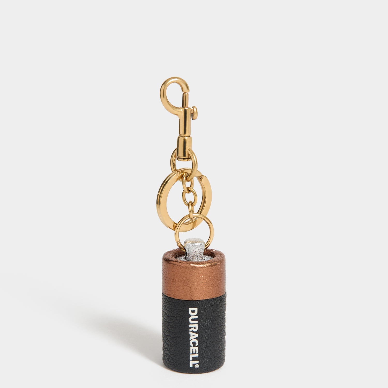 Anya Brands Duracell Charm -

          
            Capra Leather in Black -
          

          Anya Hindmarch EU
