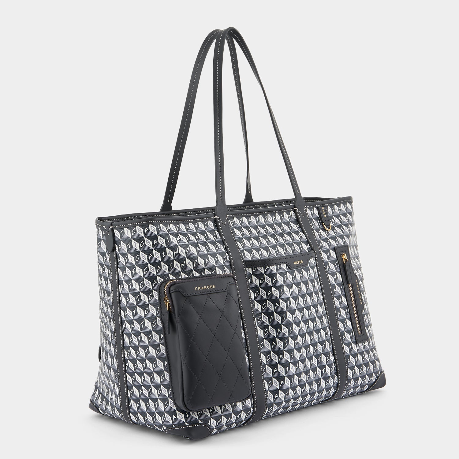 I am a Plastic Bag In-Flight Tote -

                  
                    Recycled Canvas in Charcoal -
                  

                  Anya Hindmarch EU
