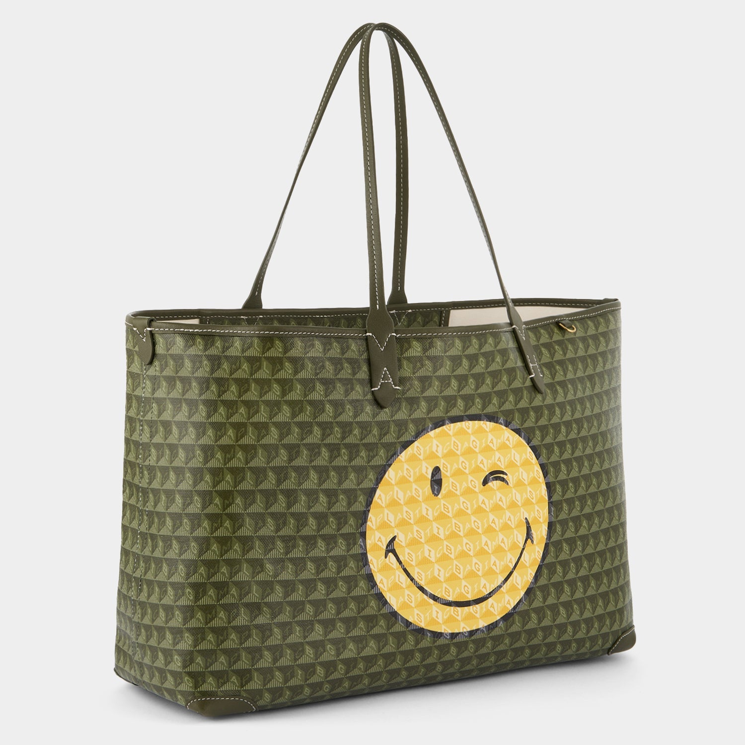 I Am A Plastic Bag Wink Tote -

                  
                    Recycled Canvas in Fern -
                  

                  Anya Hindmarch EU
