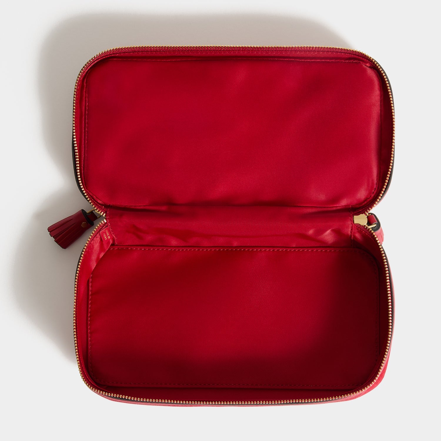 Logo Make-Up Pouch -

          
            Recycled Nylon in Medium Red -
          

          Anya Hindmarch EU
