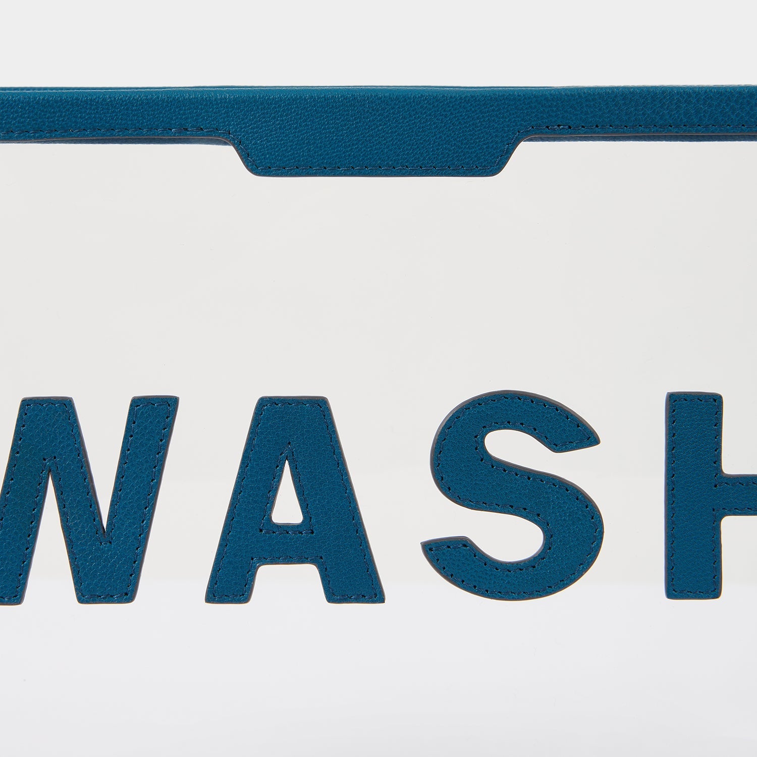 Wash Pouch -

                  
                    Capra in Clear/Light Petrol -
                  

                  Anya Hindmarch EU
