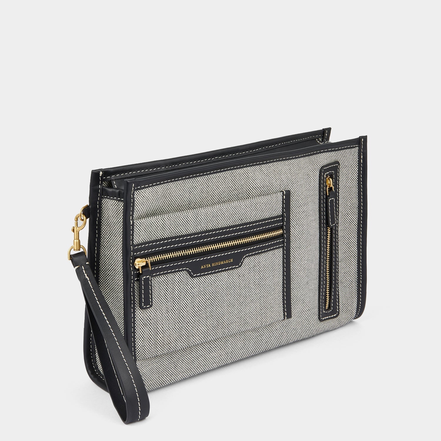 Pocket Pochette -

                  
                    Mixed Canvas in Salt And Pepper -
                  

                  Anya Hindmarch EU
