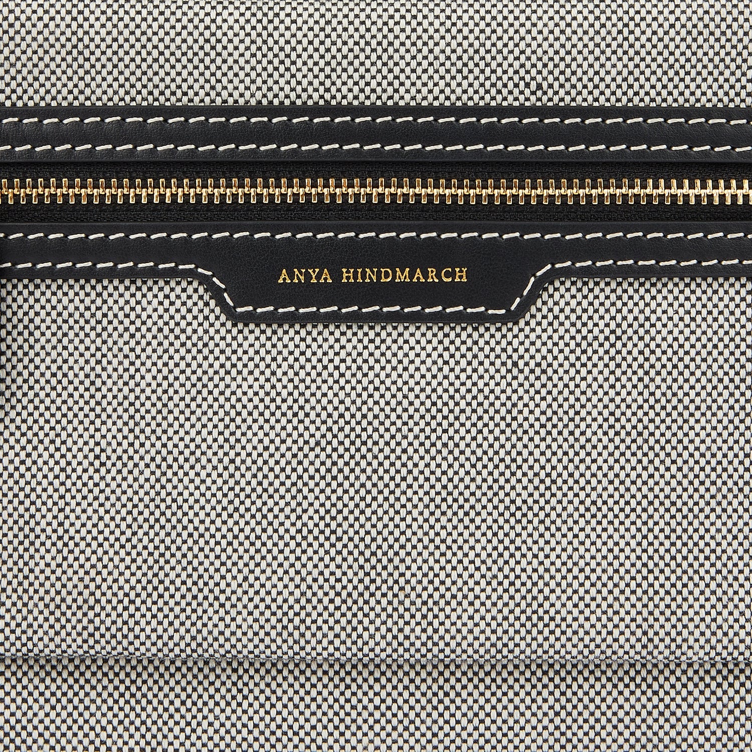 Pocket Pochette -

                  
                    Mixed Canvas in Salt And Pepper -
                  

                  Anya Hindmarch EU
