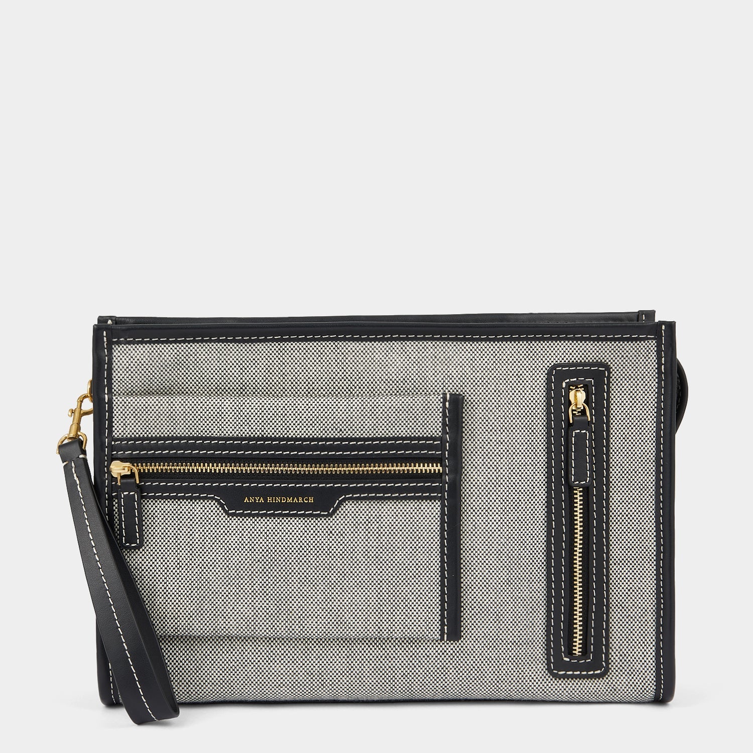 Pocket Pochette -

                  
                    Mixed Canvas in Salt and Pepper -
                  

                  Anya Hindmarch EU
