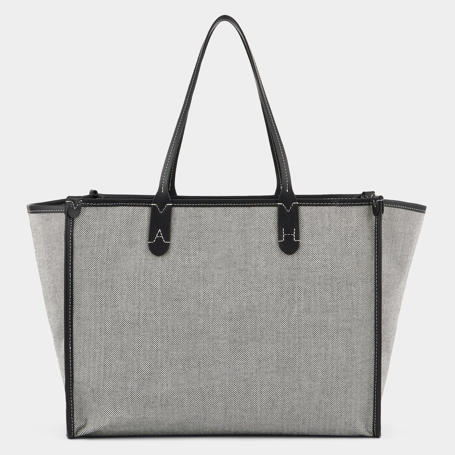 Pocket Tote -

                  
                    Mixed Canvas in Salt and Pepper -
                  

                  Anya Hindmarch EU
