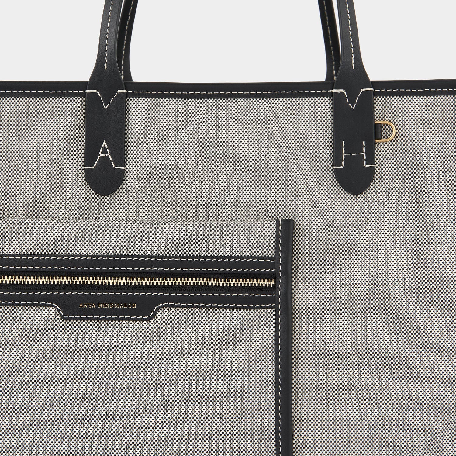 Pocket Tote -

                  
                    Mixed Canvas in Salt And Pepper -
                  

                  Anya Hindmarch EU

