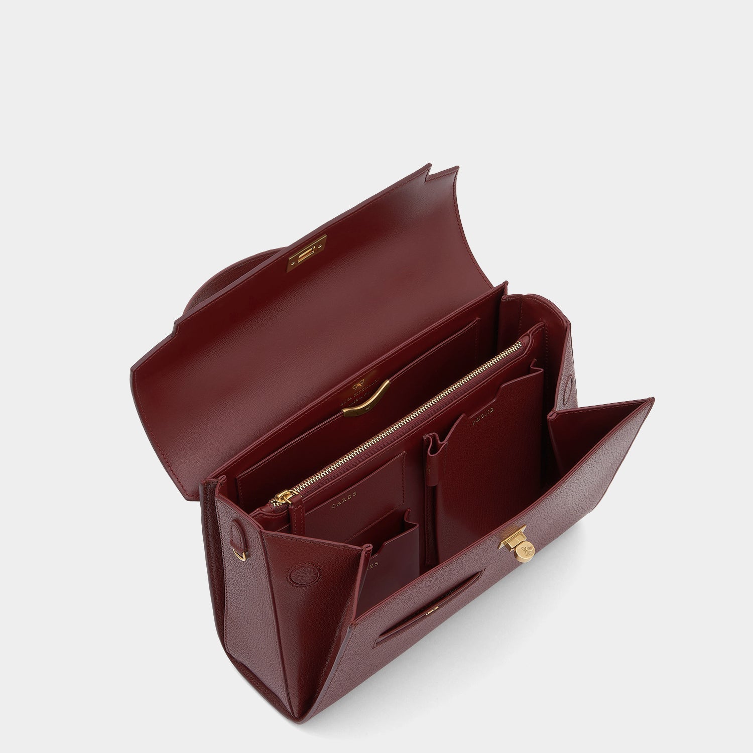 Mortimer -

                  
                    Leather in Rosewood -
                  

                  Anya Hindmarch EU
