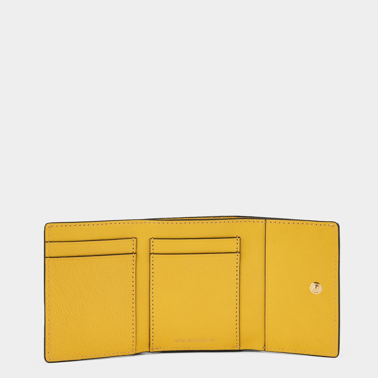 Kawaii Happy Mini Trifold -

                  
                    Capra Leather in Yellow Jade -
                  

                  Anya Hindmarch EU
