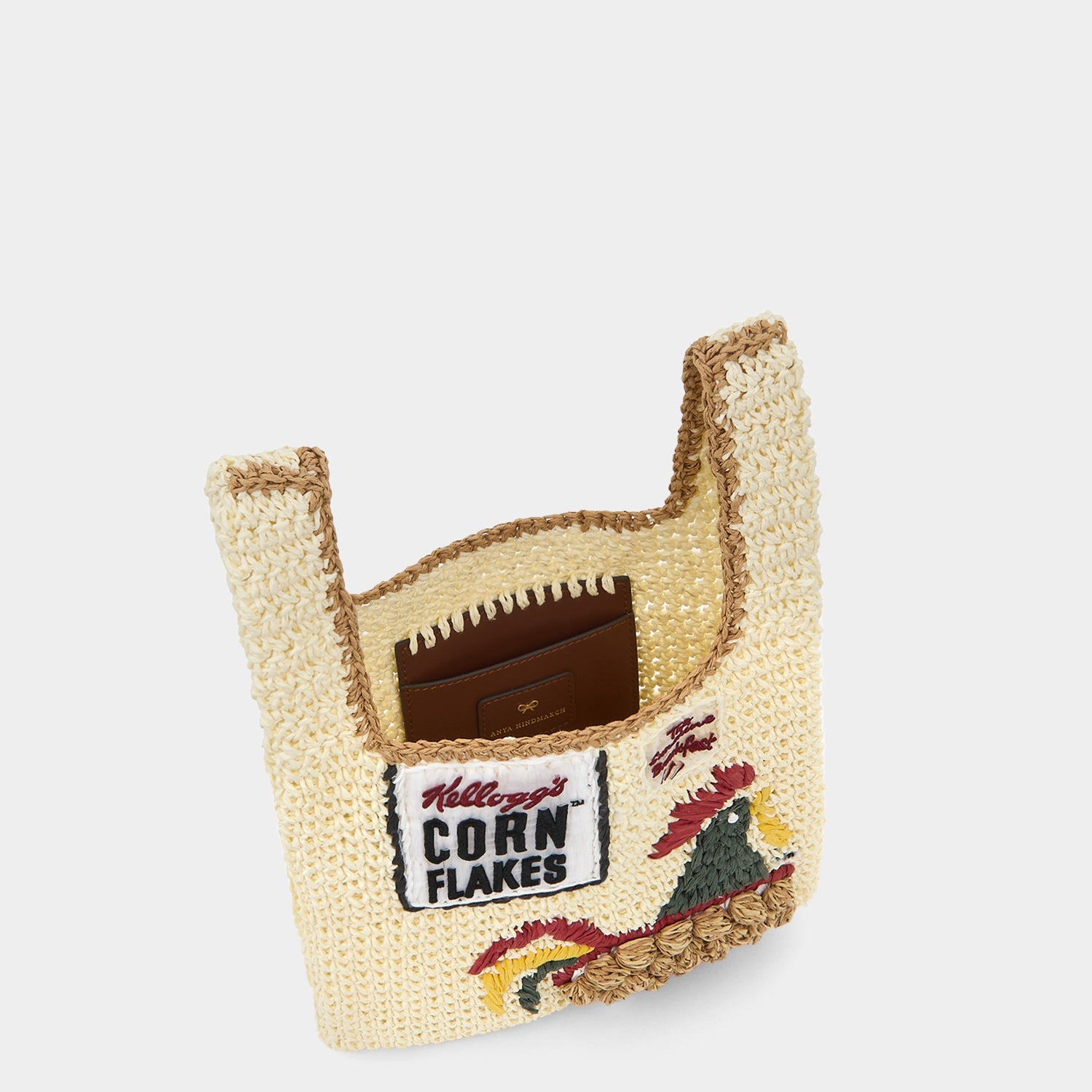 Anya Brands Corn Flakes Raffia Mini Tote -

          
            Paper Raffia in Chalk -
          

          Anya Hindmarch EU
