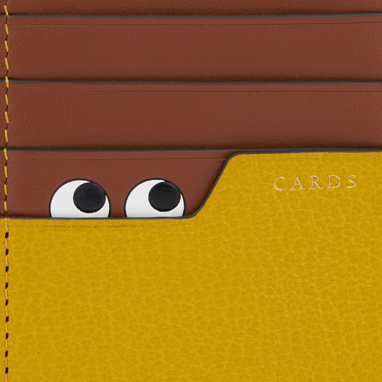Peeping Eyes Zip Card Case -

                  
                    Capra Leather in Mustard -
                  

                  Anya Hindmarch EU
