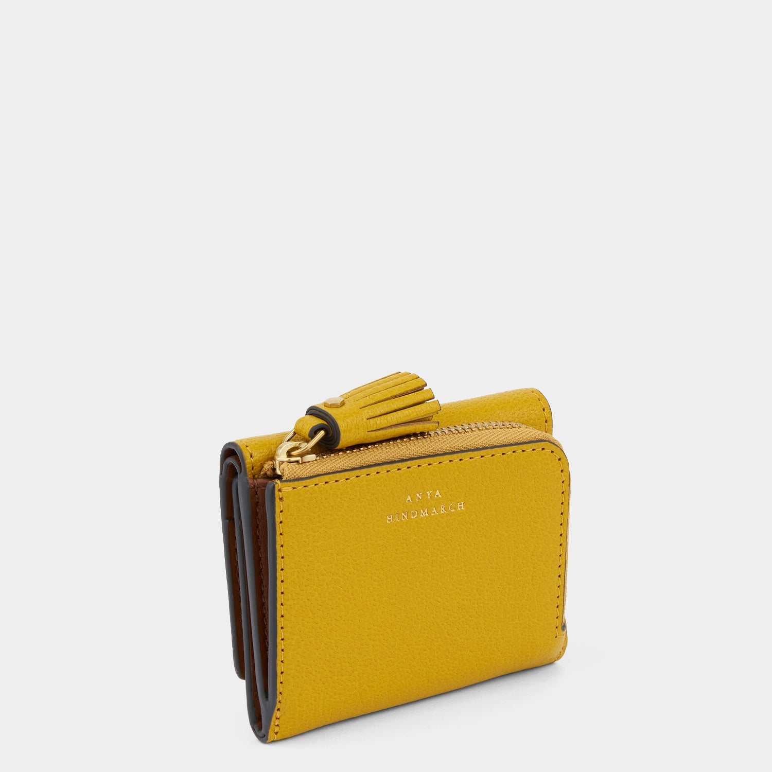 Peeping Eyes Mini Trifold Zip Wallet -

                  
                    Capra Leather in Mustard -
                  

                  Anya Hindmarch EU
