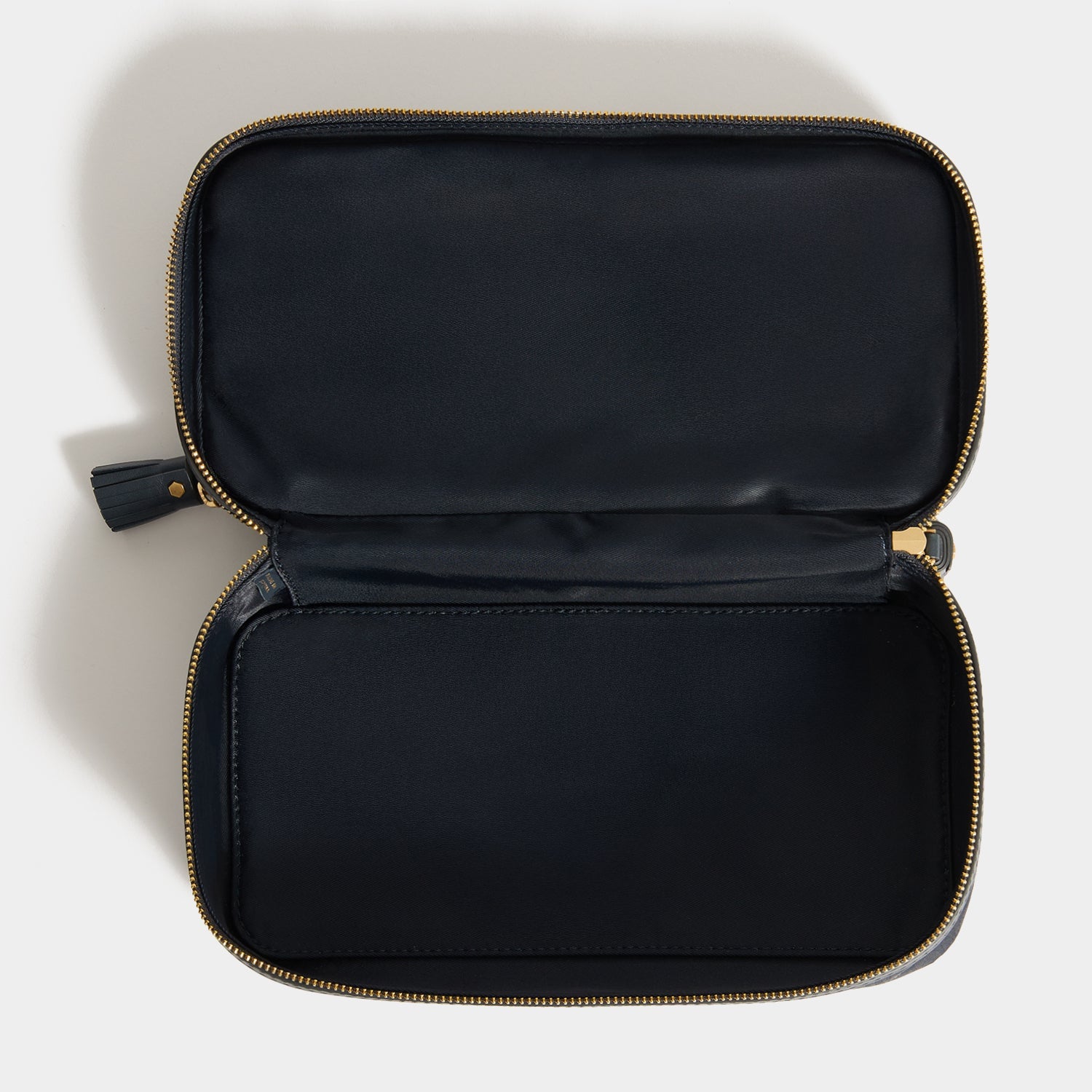 Logo Make-Up Pouch -

          
            Nylon Jacquard in New Marine -
          

          Anya Hindmarch EU
