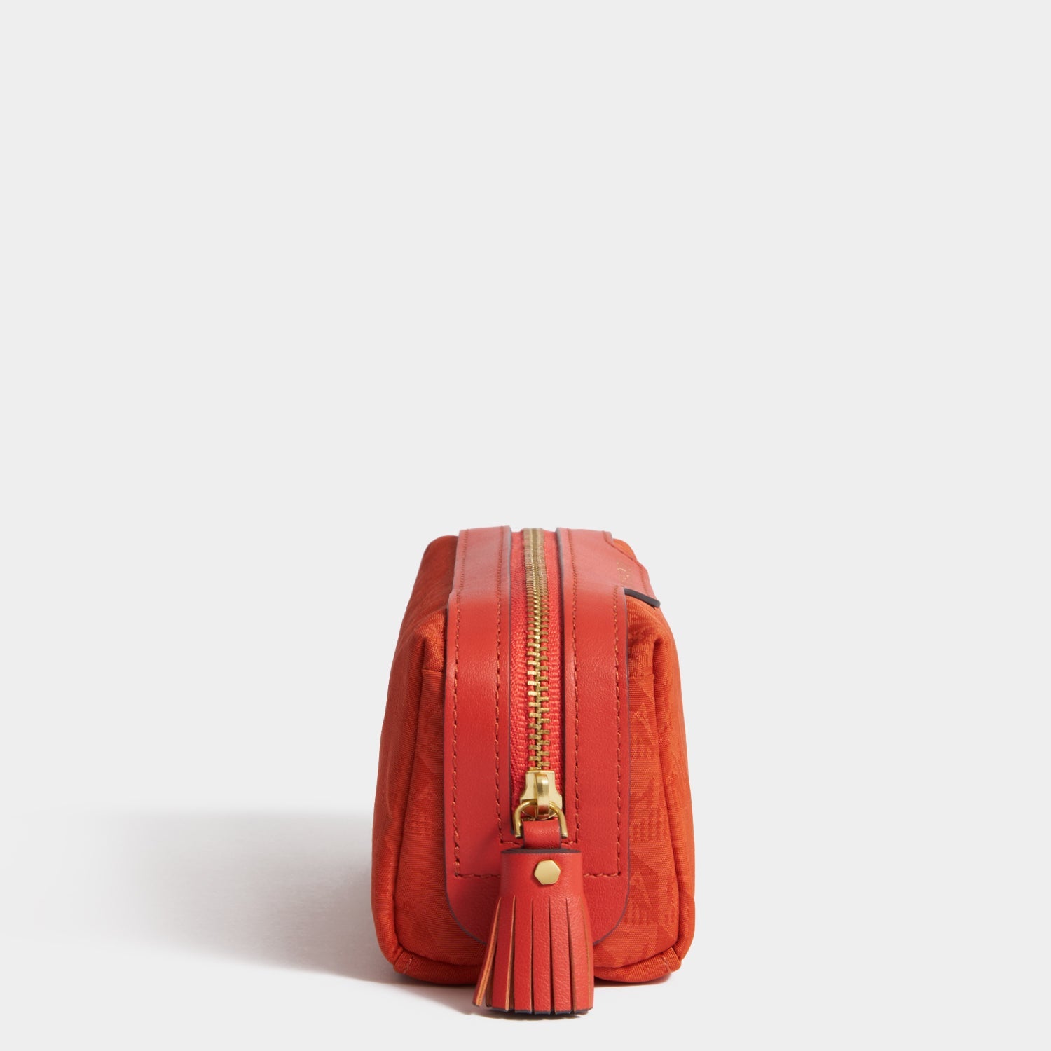 Logo Girlie Stuff Pouch -

          
            Jacquard Nylon in Burnt Sienna -
          

          Anya Hindmarch EU
