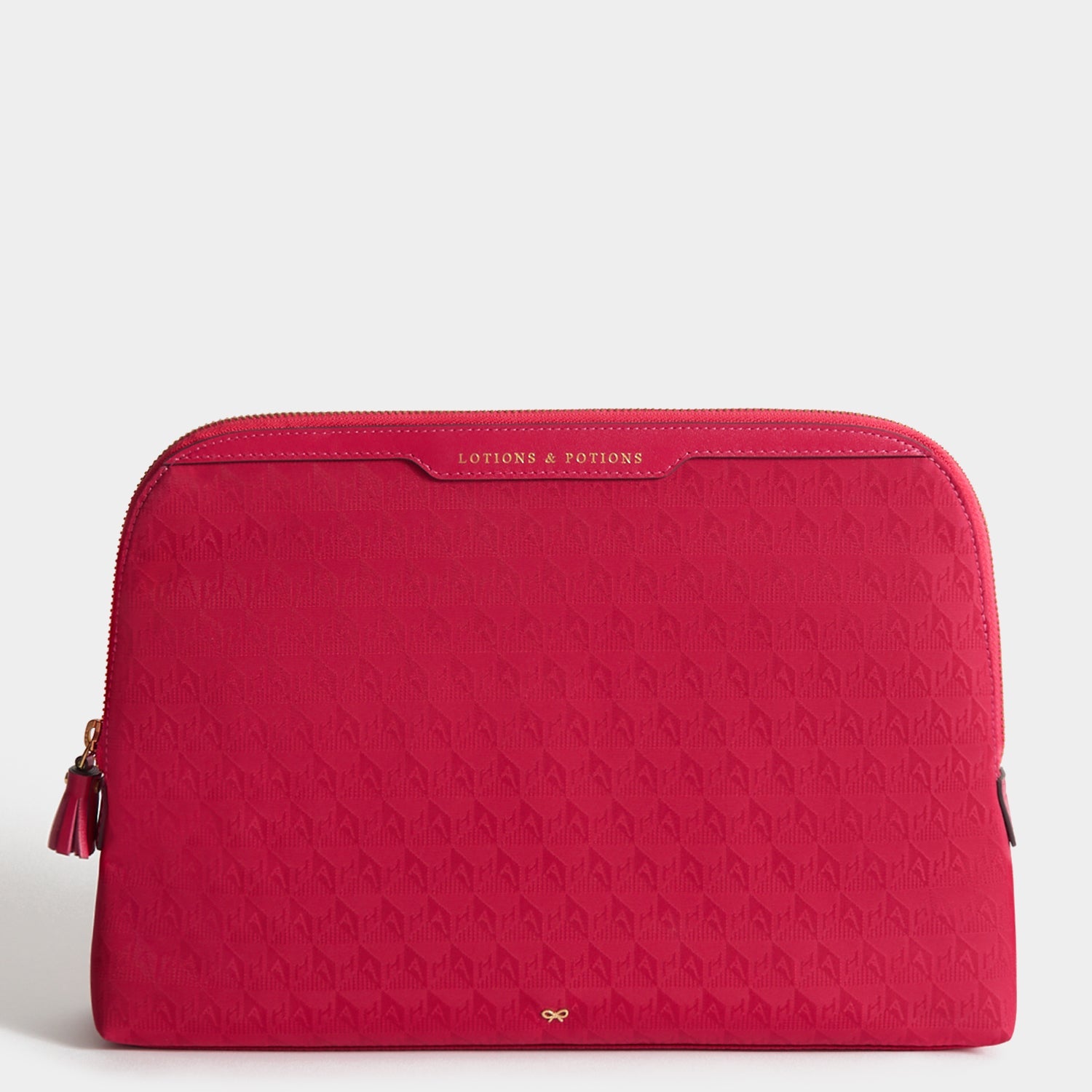 Logo Lotions and Potions Pouch -

          
            Jacquard Nylon Potions in Magenta -
          

          Anya Hindmarch EU
