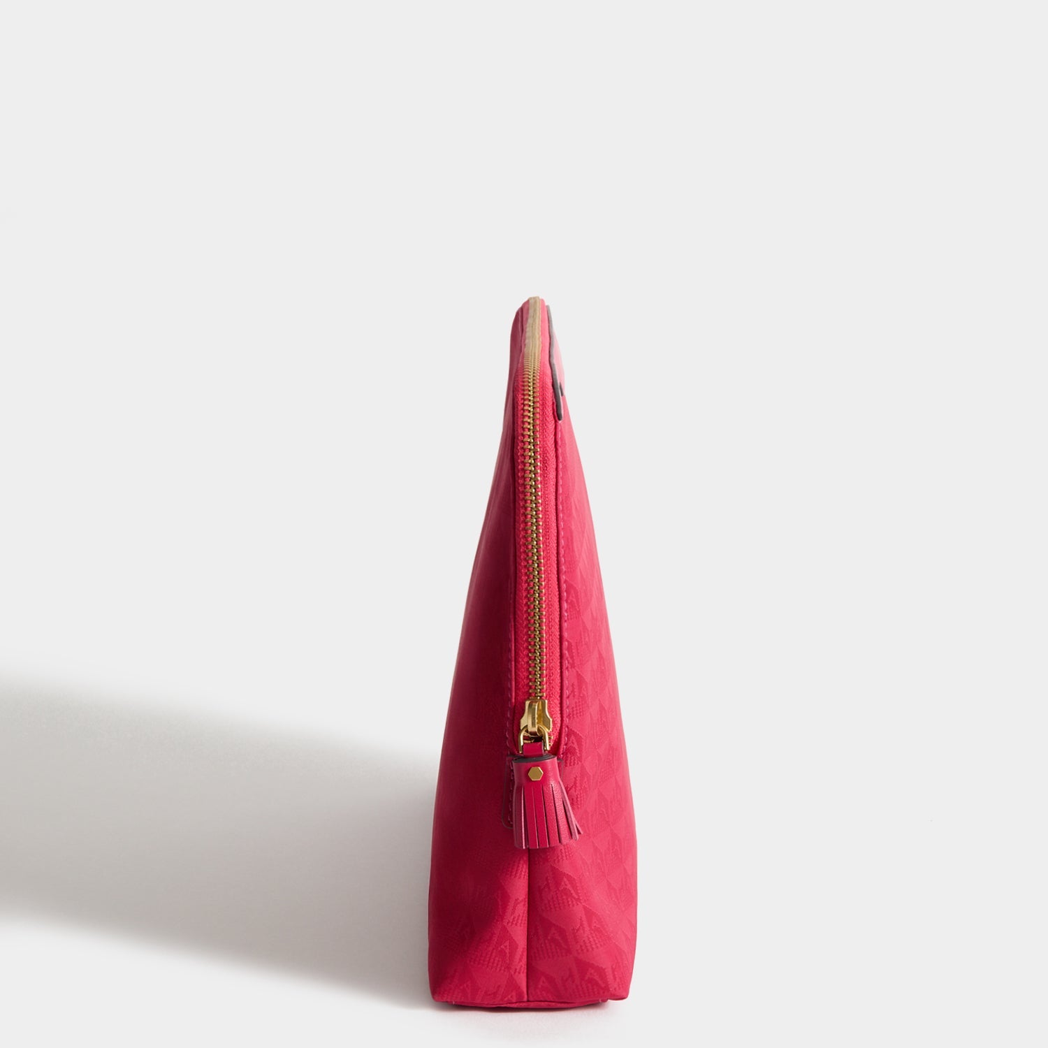Logo Lotions and Potions Pouch -

          
            Jacquard Nylon Potions in Magenta -
          

          Anya Hindmarch EU
