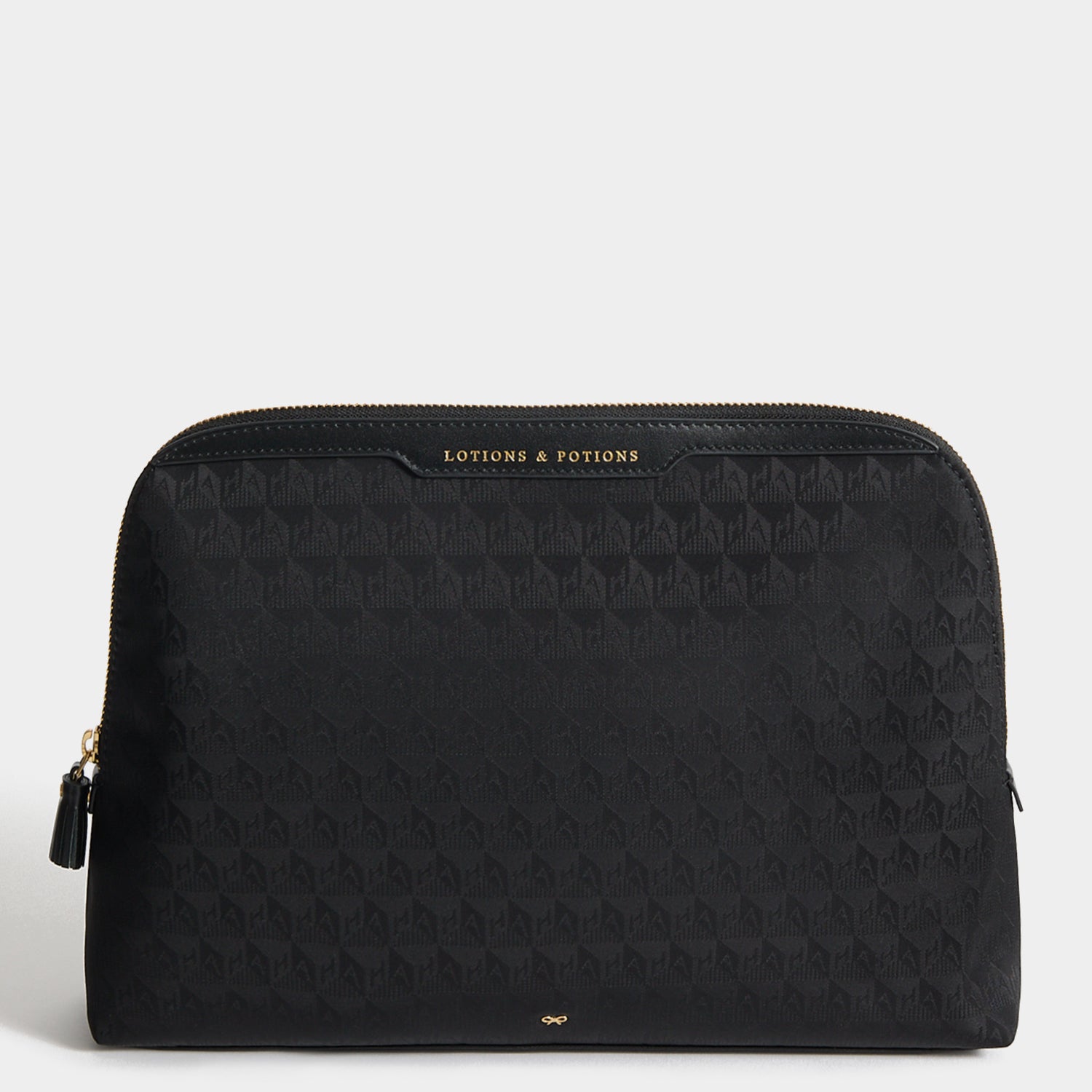 Logo Lotions and Potions Pouch -

          
            Recycled Nylon in Black -
          

          Anya Hindmarch EU
