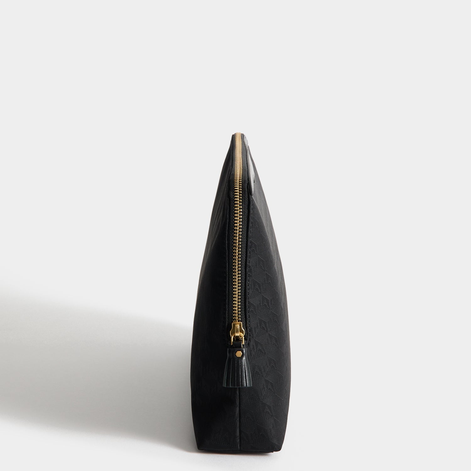 Logo Lotions and Potions Pouch -

          
            Recycled Nylon in Black -
          

          Anya Hindmarch EU
