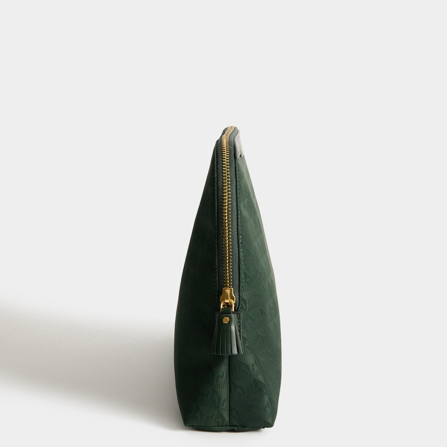 Logo Lotions and Potions Pouch -

          
            Jacquard Nylon in Dark Holly -
          

          Anya Hindmarch EU
