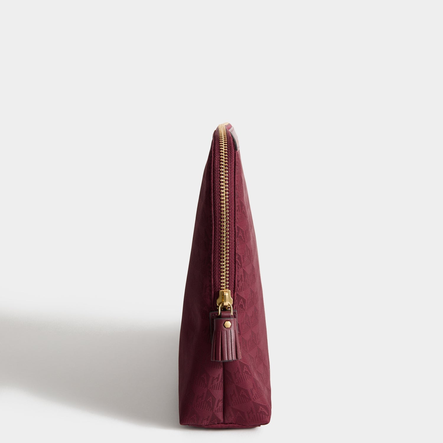 Logo Lotions and Potions Pouch -

          
            Jacquard Nylon in Medium Red -
          

          Anya Hindmarch EU
