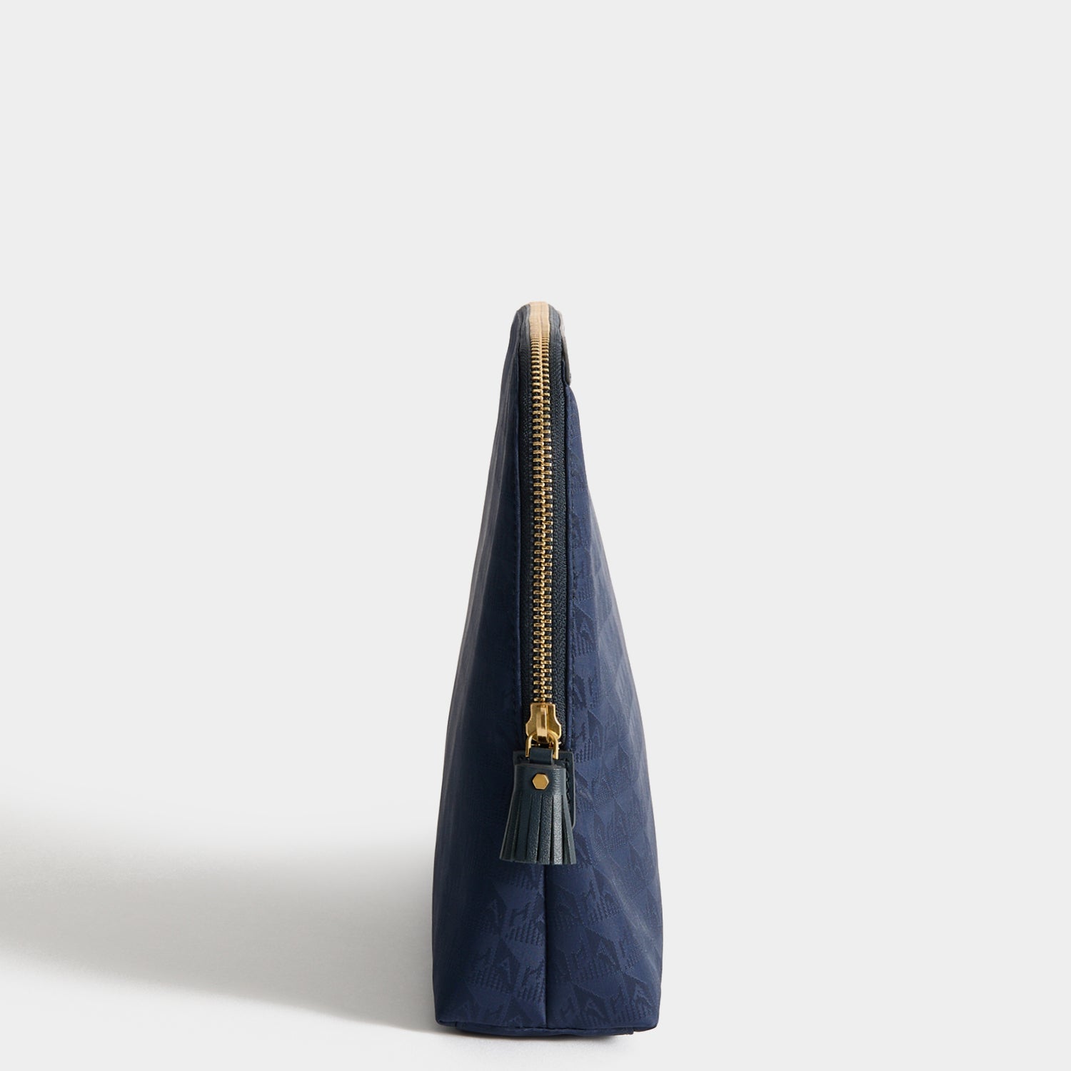 Logo Lotions and Potions Pouch -

          
            Jacquard Nylon in New Marine -
          

          Anya Hindmarch EU
