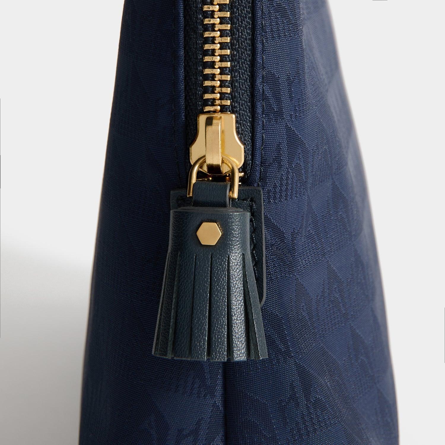 Logo Lotions and Potions Pouch -

          
            Jacquard Nylon in New Marine -
          

          Anya Hindmarch EU
