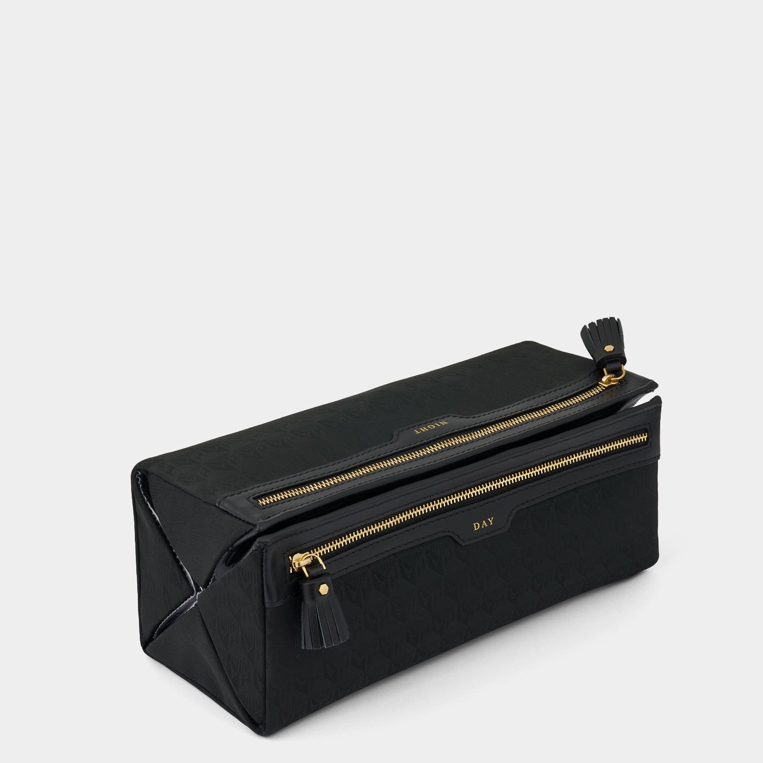 Logo Night and Day Pouch -

                  
                    Recycled Nylon in Black -
                  

                  Anya Hindmarch EU

