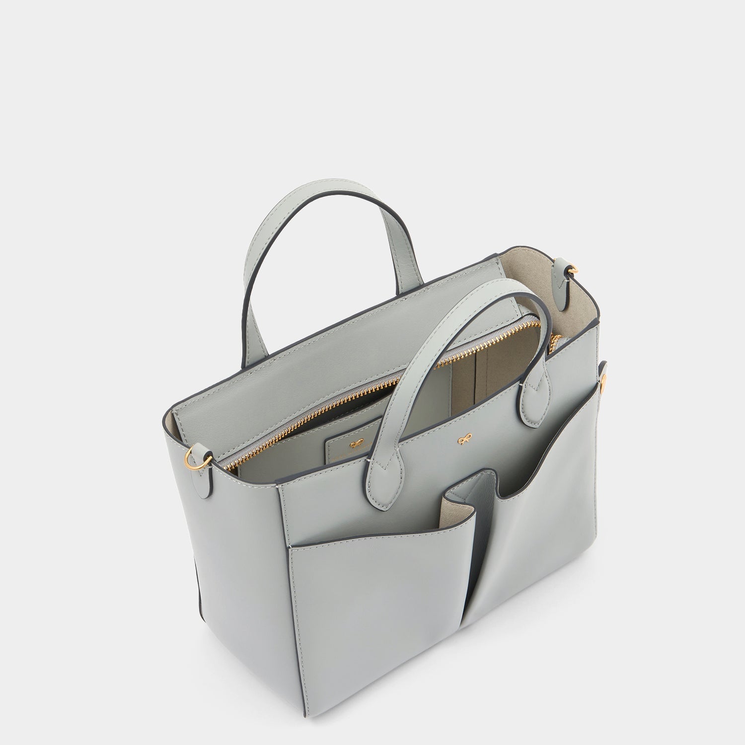 Nevis XS Tote -

          
            Smooth Leather in Light Blue -
          

          Anya Hindmarch EU
